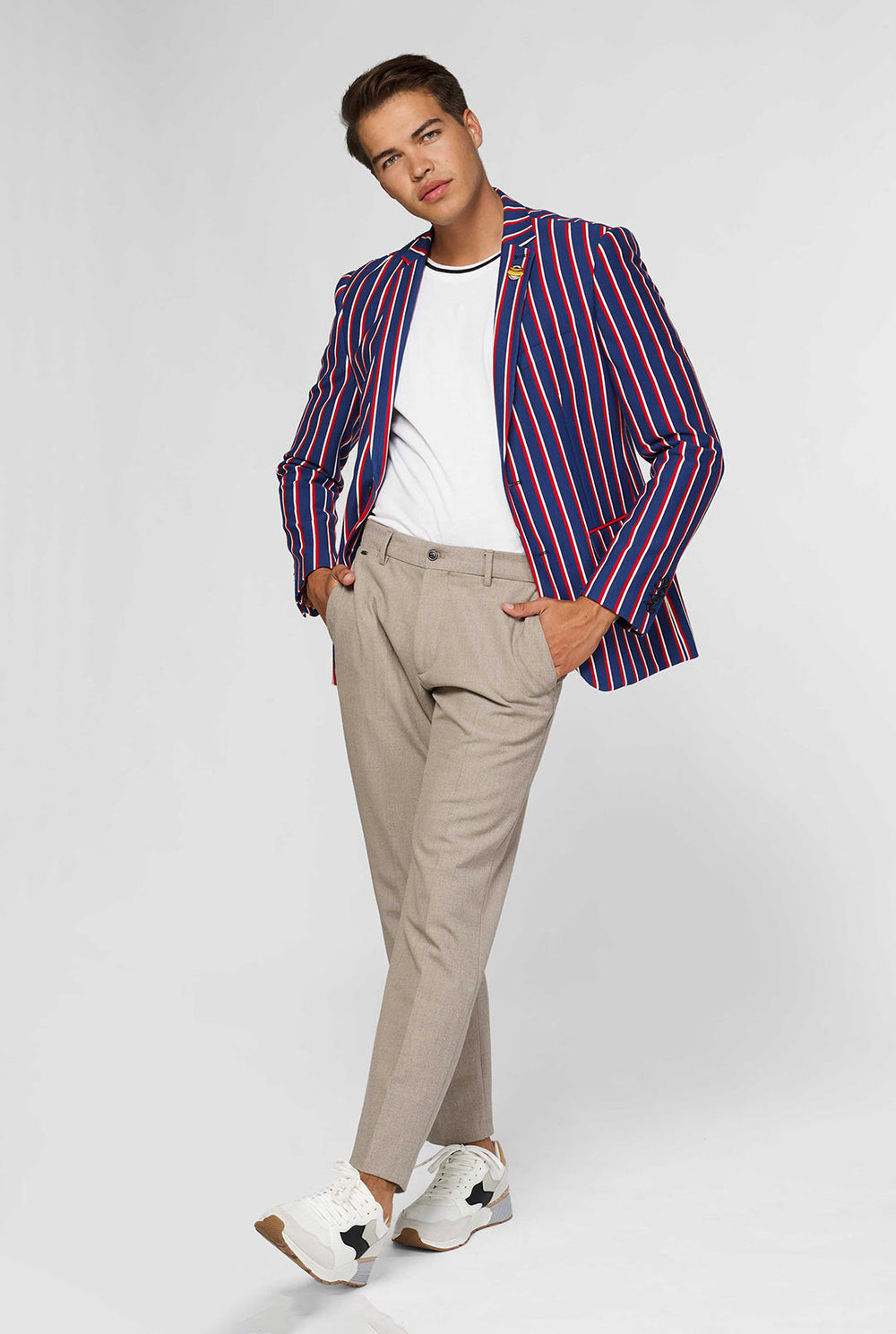 Red white and blue striped casual blazer worn by man