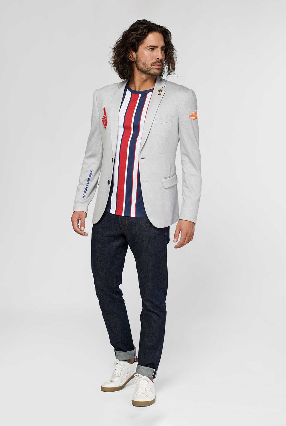 Grey sportswear casual blazer with sports patches worn by man