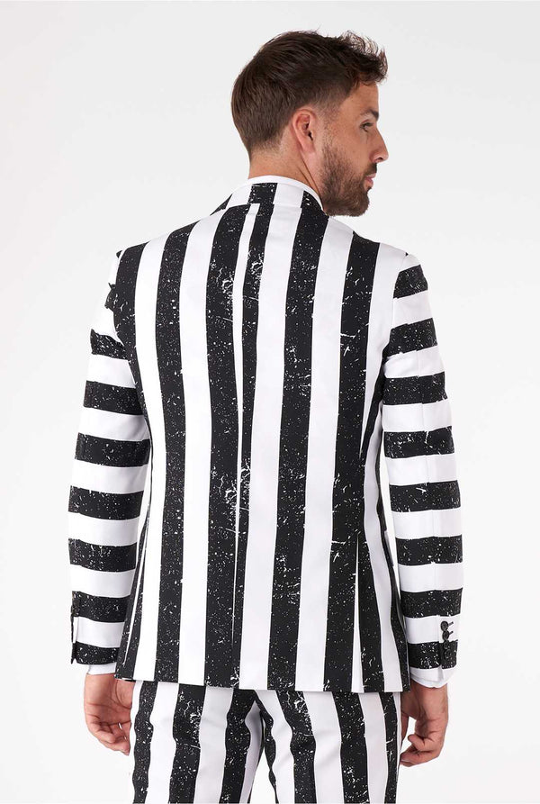 Man wearing striped black and white men's suit