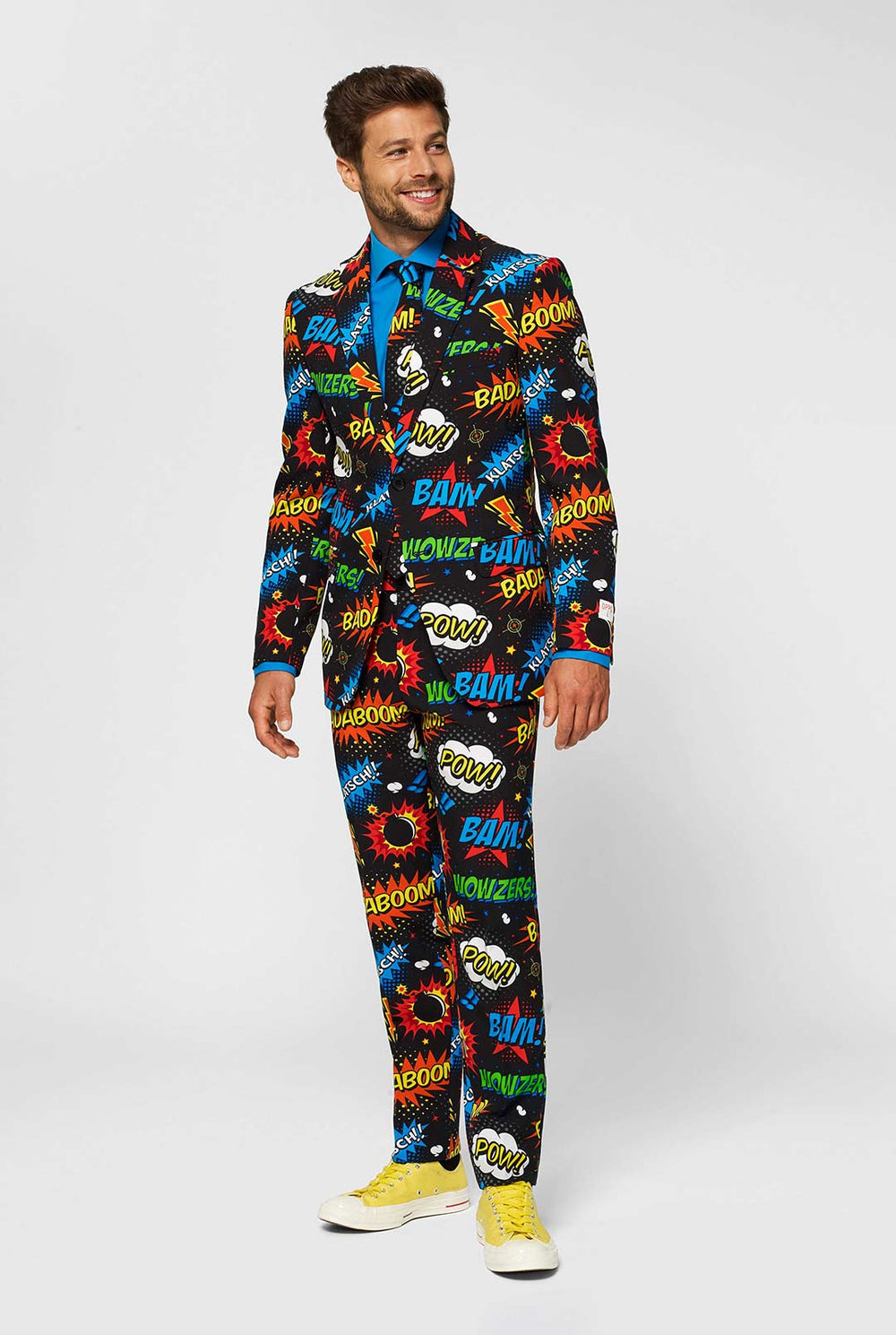 Black men's suit with comic book icons print worn by man