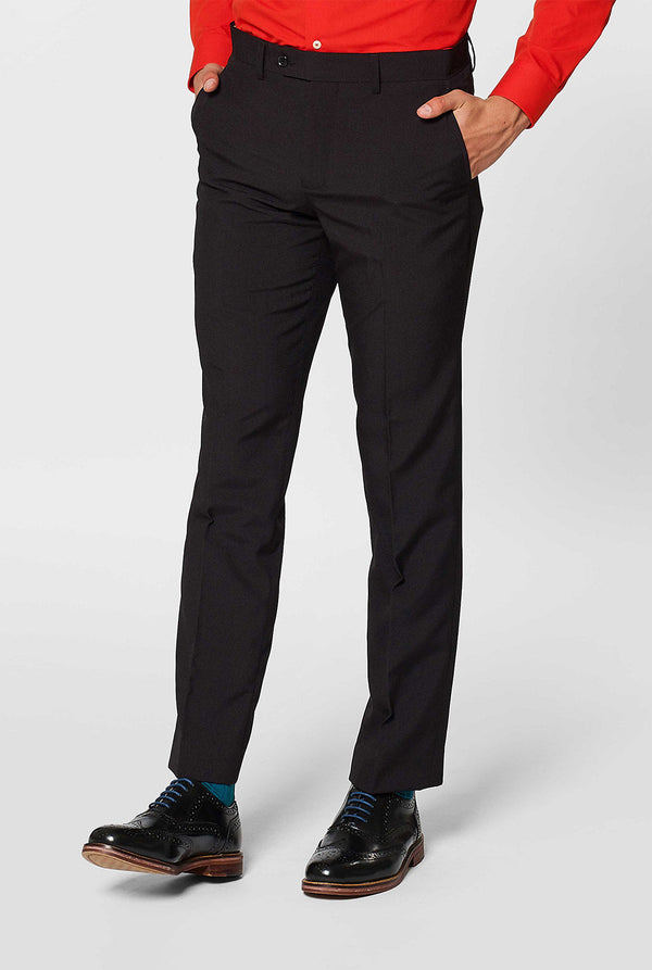 All black men's suit worn by man
