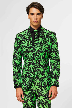 Man wearing black men's suit with green cannabis print