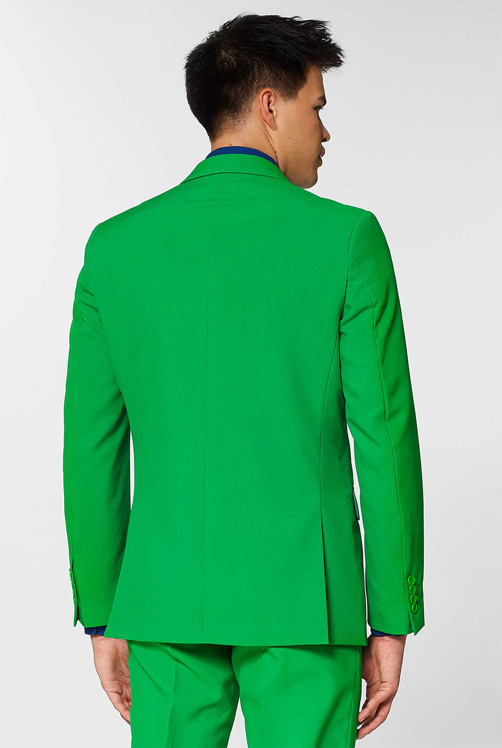 Video of man wearing Evergreen green men's suit, showing suit like a model. Suit consists of blazer, pant and tie.