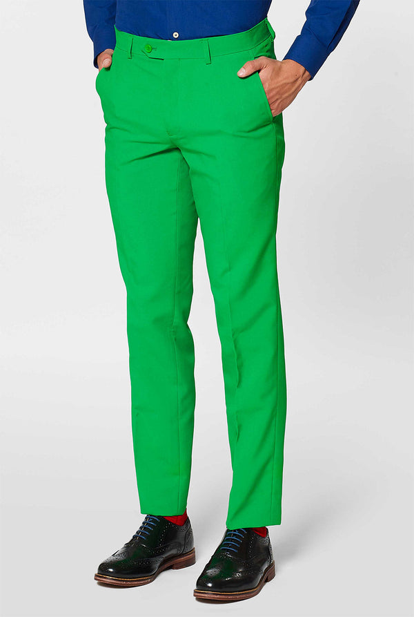 Man wearing green men's suit and dark blue dress shirt