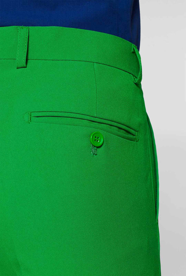 Man wearing green men's suit and dark blue dress shirt