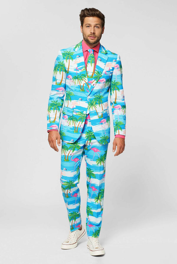 Blue and white men's suit with tropical flamingo print Flaminguy worn by man close up