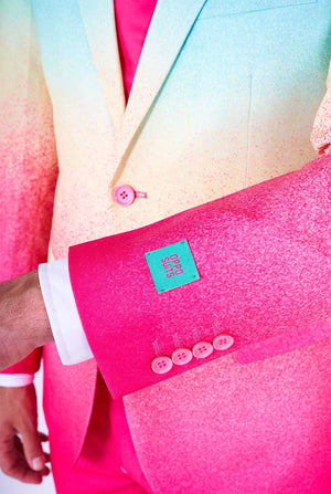 Man wearing rainbow colored suit