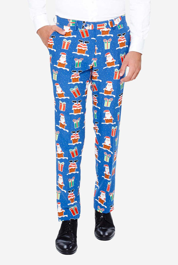 Man wearing blue Christmas suit with Christmas icons