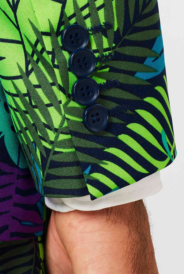 Jungle print men's suit with green and purple leaf print worn by man