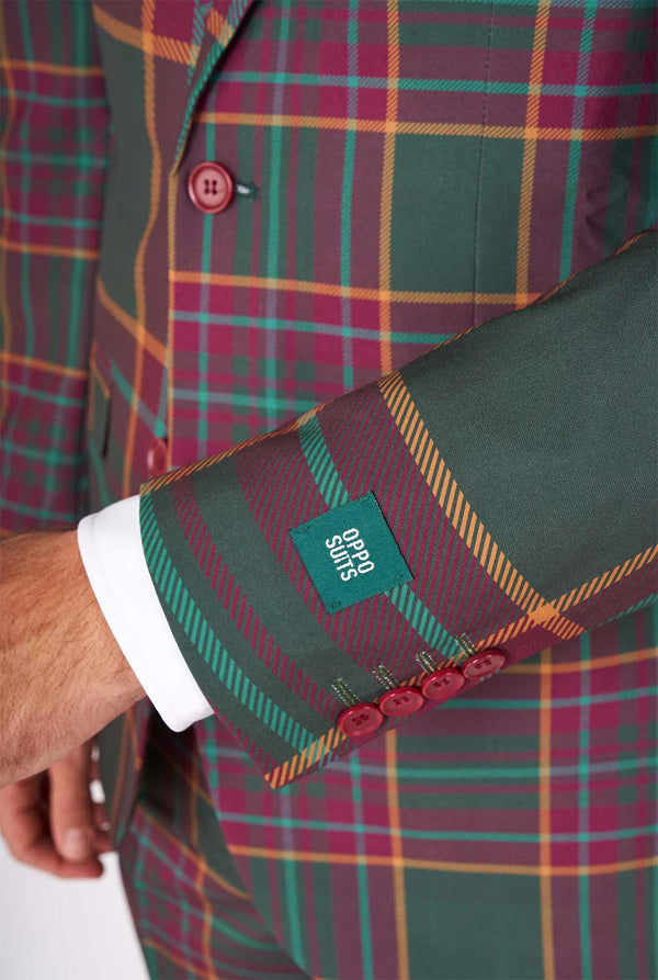 Man wearing a tartan plaid Christmas suit