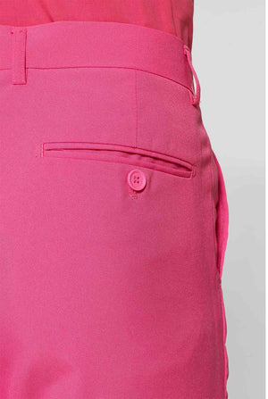 Man wearing pink men's suit with pink dress shirt