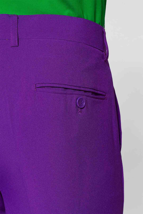 Man wearing purple men's suit and green dress shirt