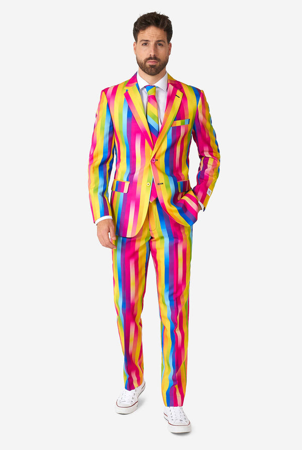 Man wearing rainbow-colored suit