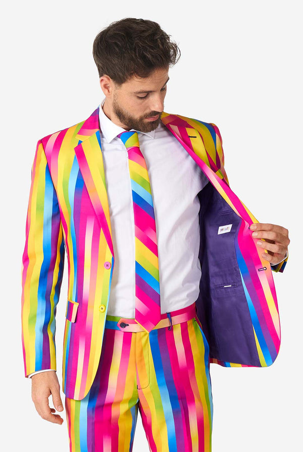 Man wearing rainbow-colored suit