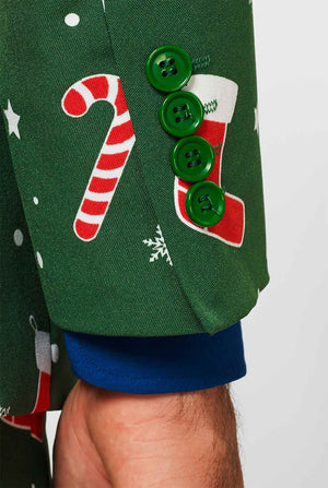 Man wearing green Christmas suit and blue dress shirt