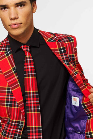 Man wearing red Christmas tartan men's suit