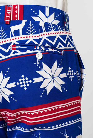 Man wearing blue Christmas suit with Nordic themed print