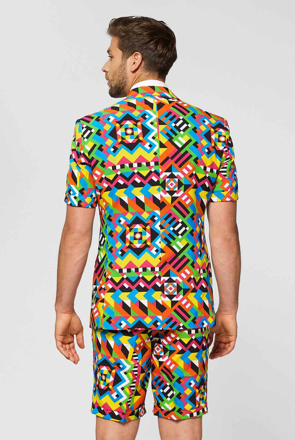 Man wearing colorful summer suit, consisting of short, jacket and tie