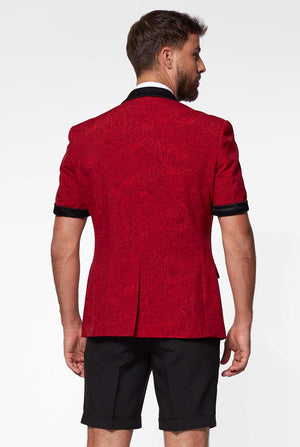 Man wearing red summer tuxedo with flower print