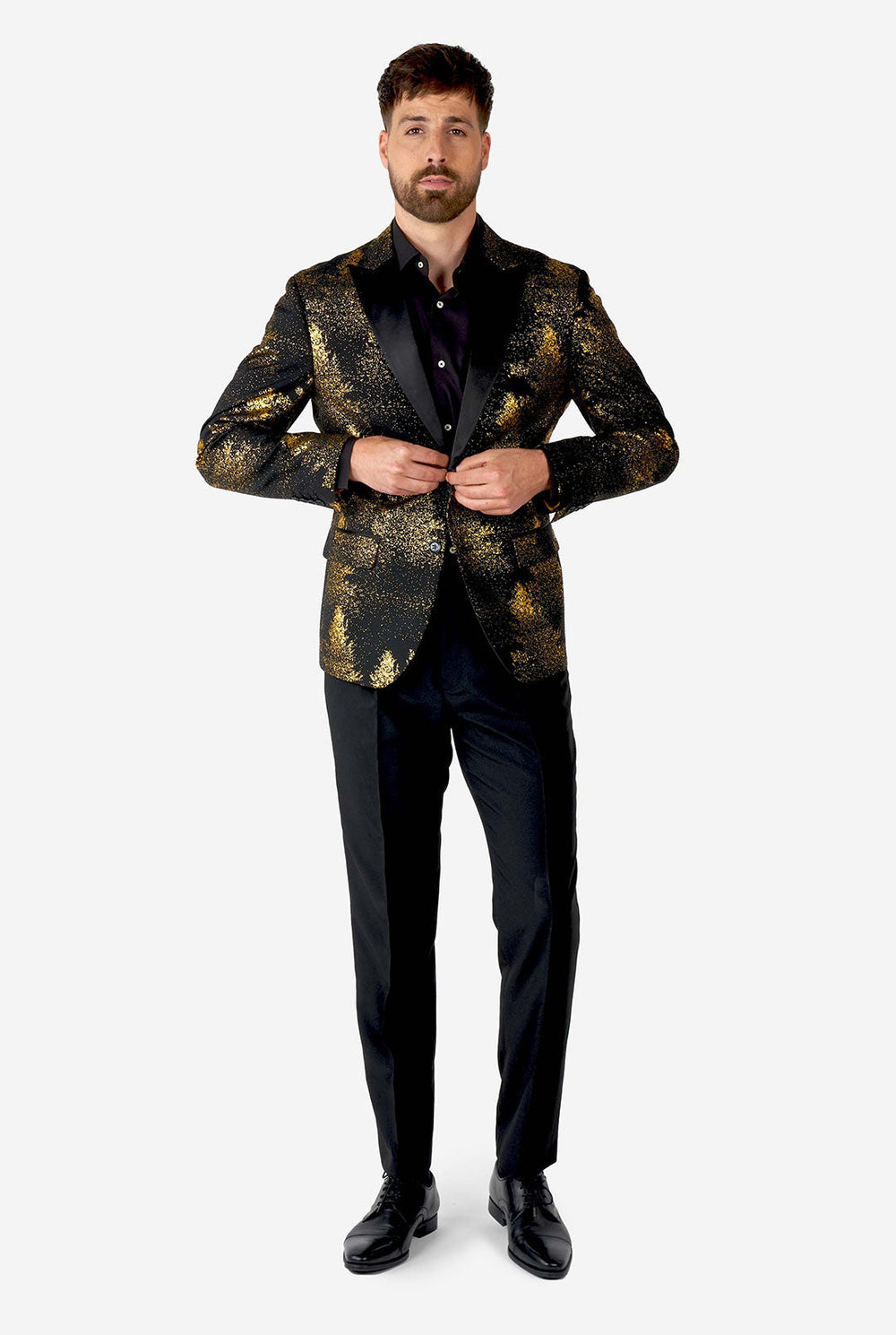 Man wearing black blazer with golden Christmas tree print