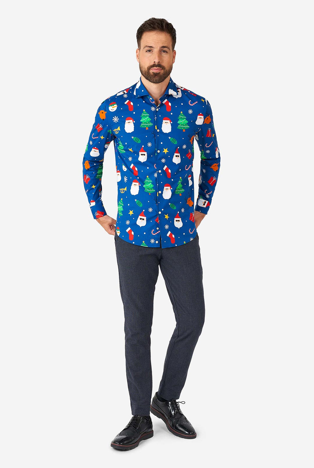 Man wearing blue Christmas dress shirt with Christmas icons