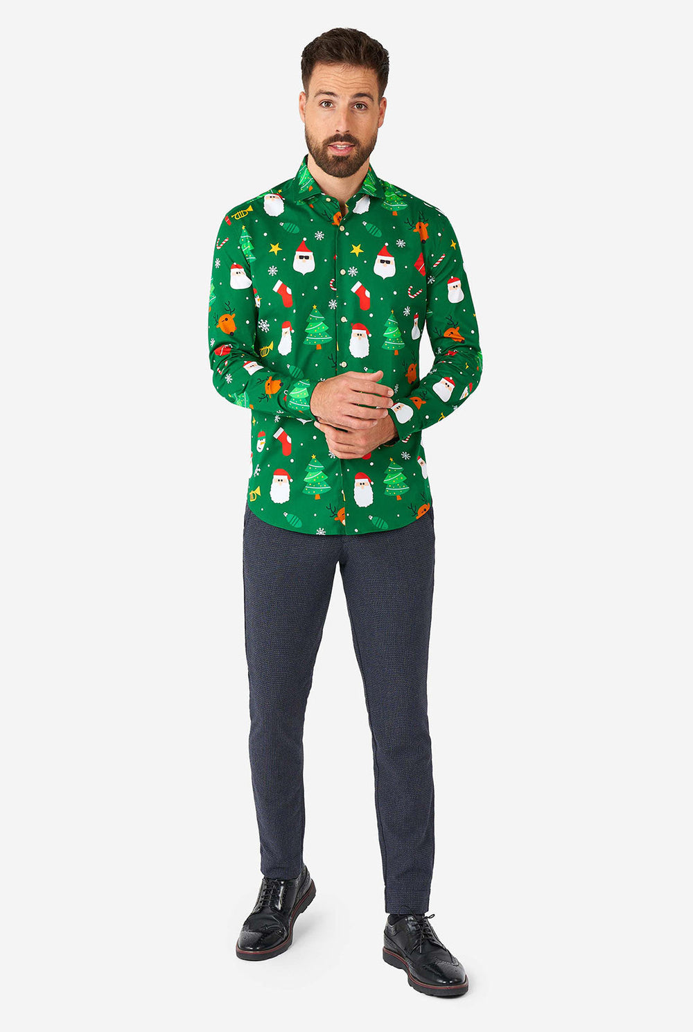 Man wearing green Christmas dress shirt with Christmas icons