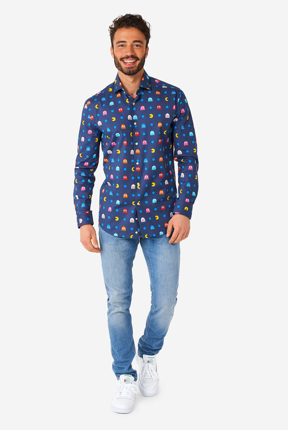 Man wearing blue dress shirt with Pac-Man icons