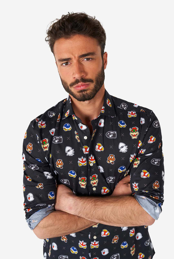 Man wearing black dress shirt with Super Mario bad guys icons