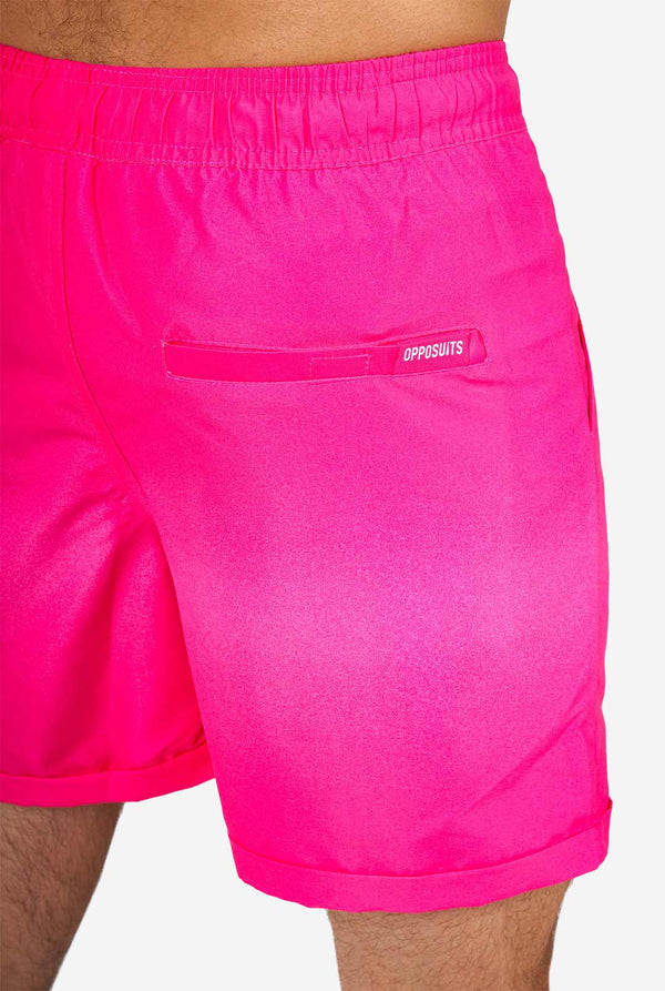 Man wearing colorful summer shorts and shirt