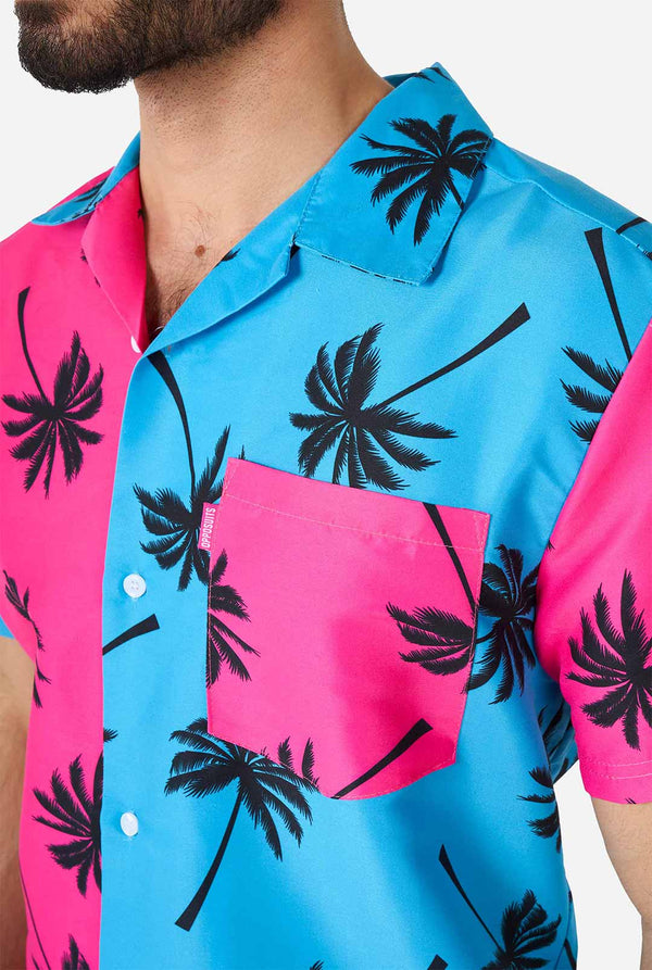 Man wearing summer set consisting of shorts and shirt