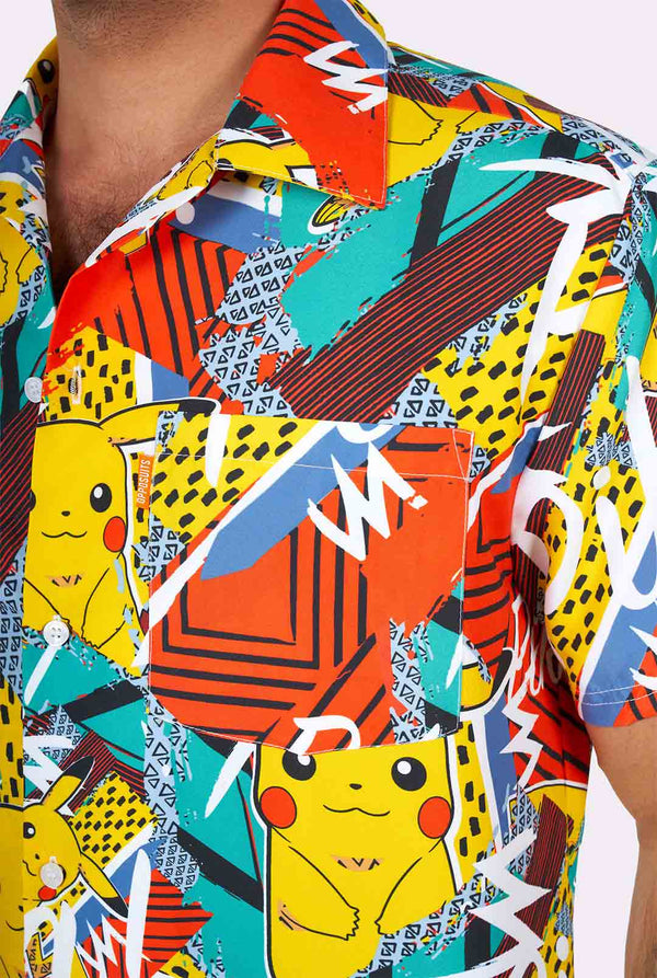 Man wearing colorful summer shorts and shirt with Pikachu Pokemon print