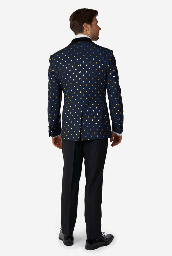 Man wearing blue tuxedo with golden dots