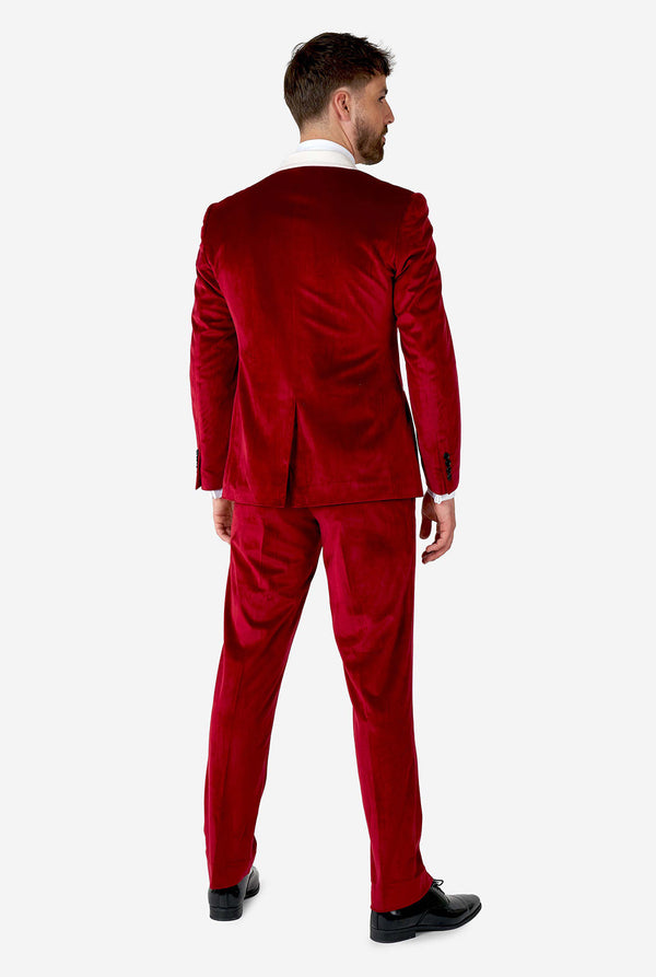Man wearing red and white santa Christmas tuxedo