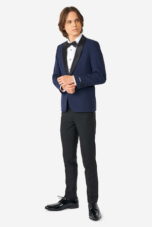 Teen wearing blue and black tuxedo