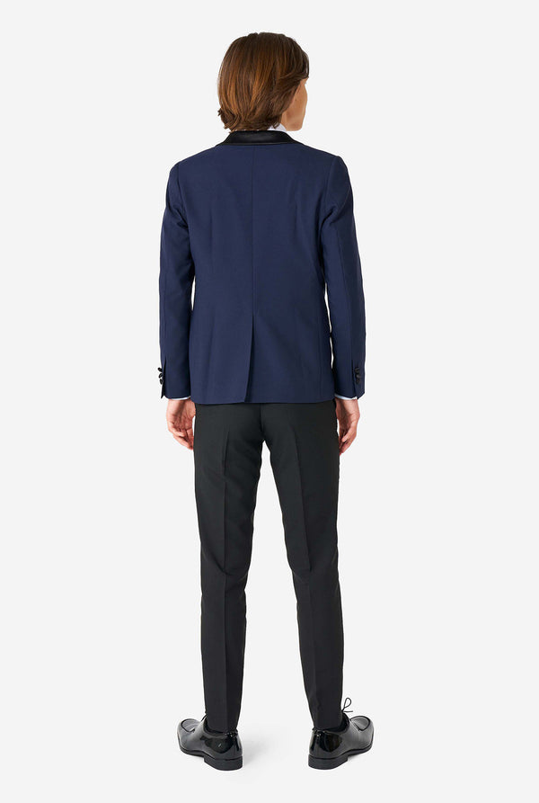 Teen wearing blue and black tuxedo