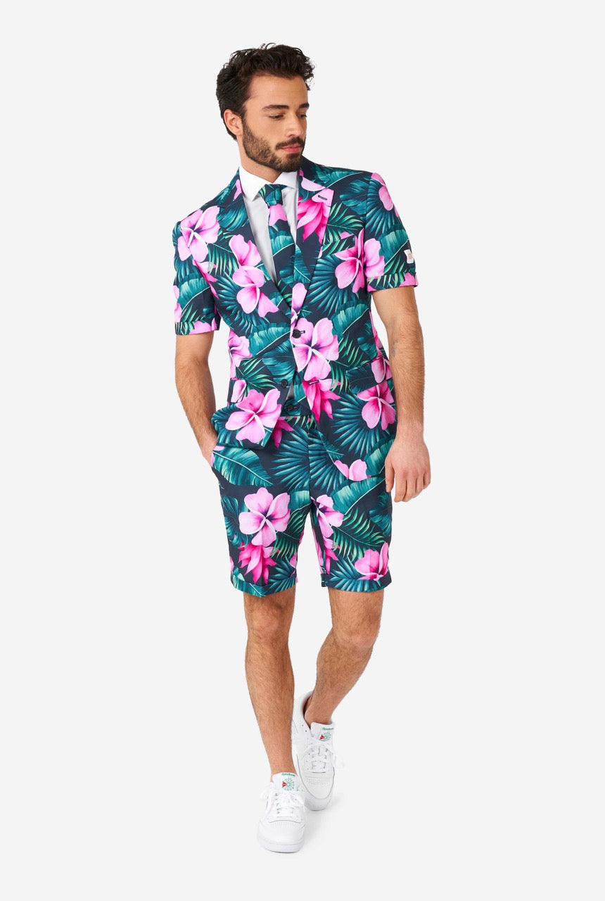 Man wearing blue summer suit with pink flowers in Hawaiian print